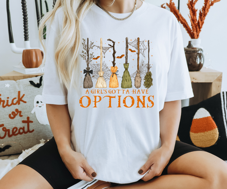 A Girl’s Gotta Have Options Broomstick Tee