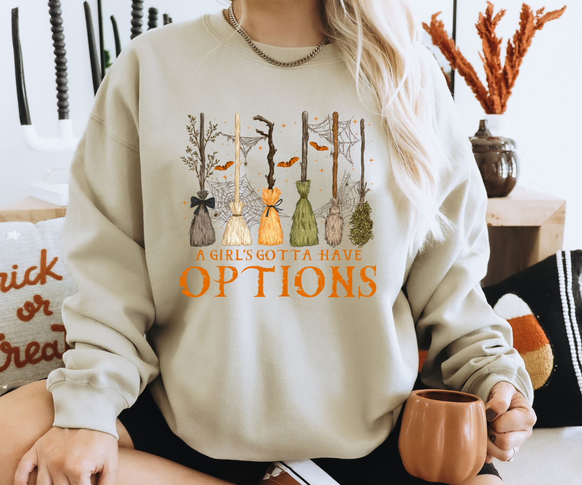 A Girl’s Gotta Have Options Broomstick Sweatshirt