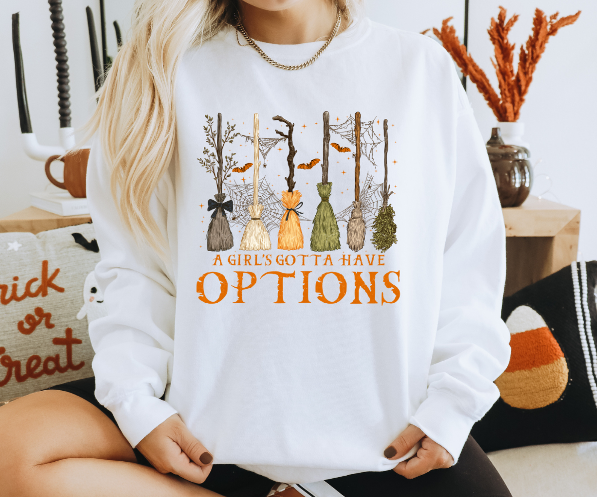 A Girl’s Gotta Have Options Broomstick Sweatshirt